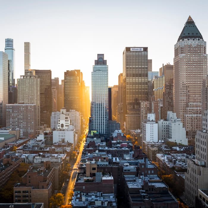 Modern city skyline representing opportunity and wealth building